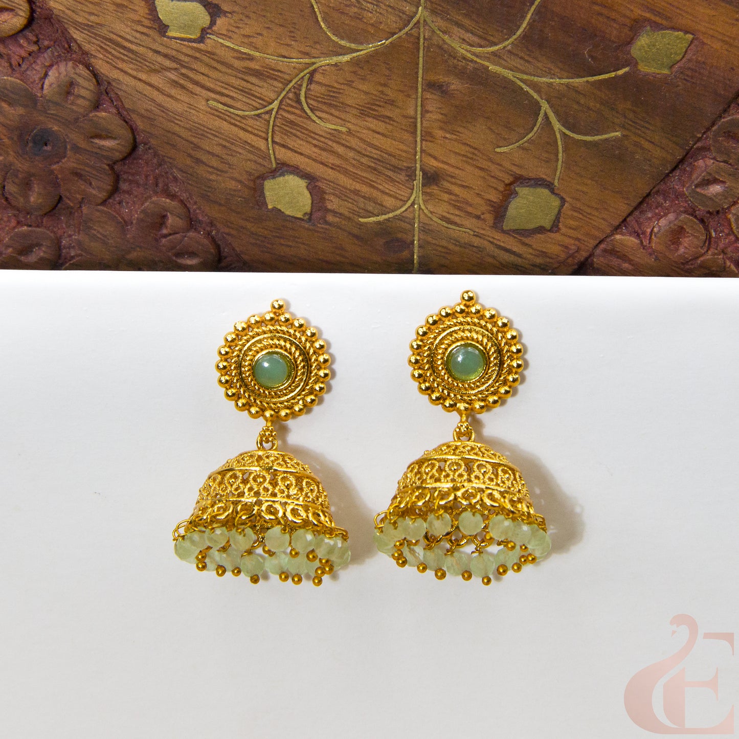 Front view of Antique Earring Light weight Premium Jhumka light green stone