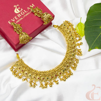 Top view of Gold Plated Necklace & Jhumka green ruby stones