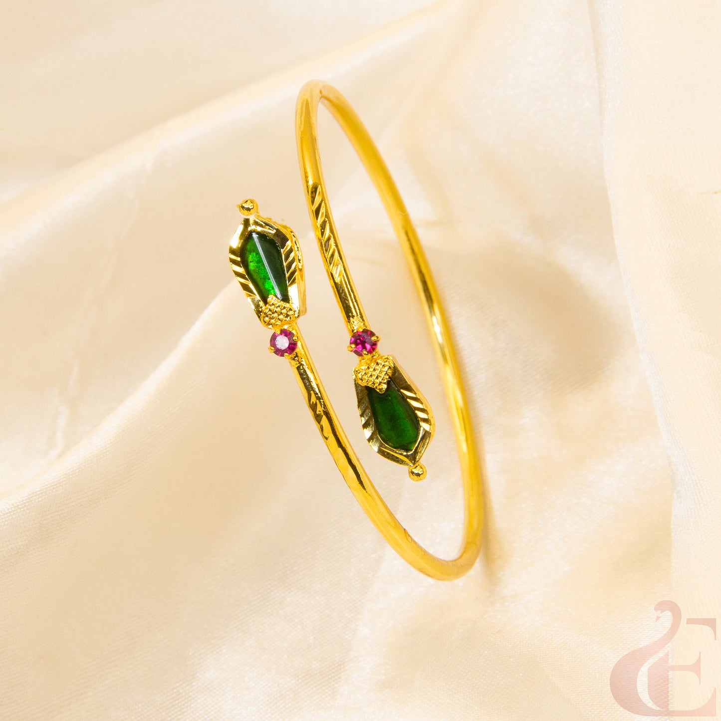 Top view of Gold nagapadam Kerala style kada , Green ruby stones