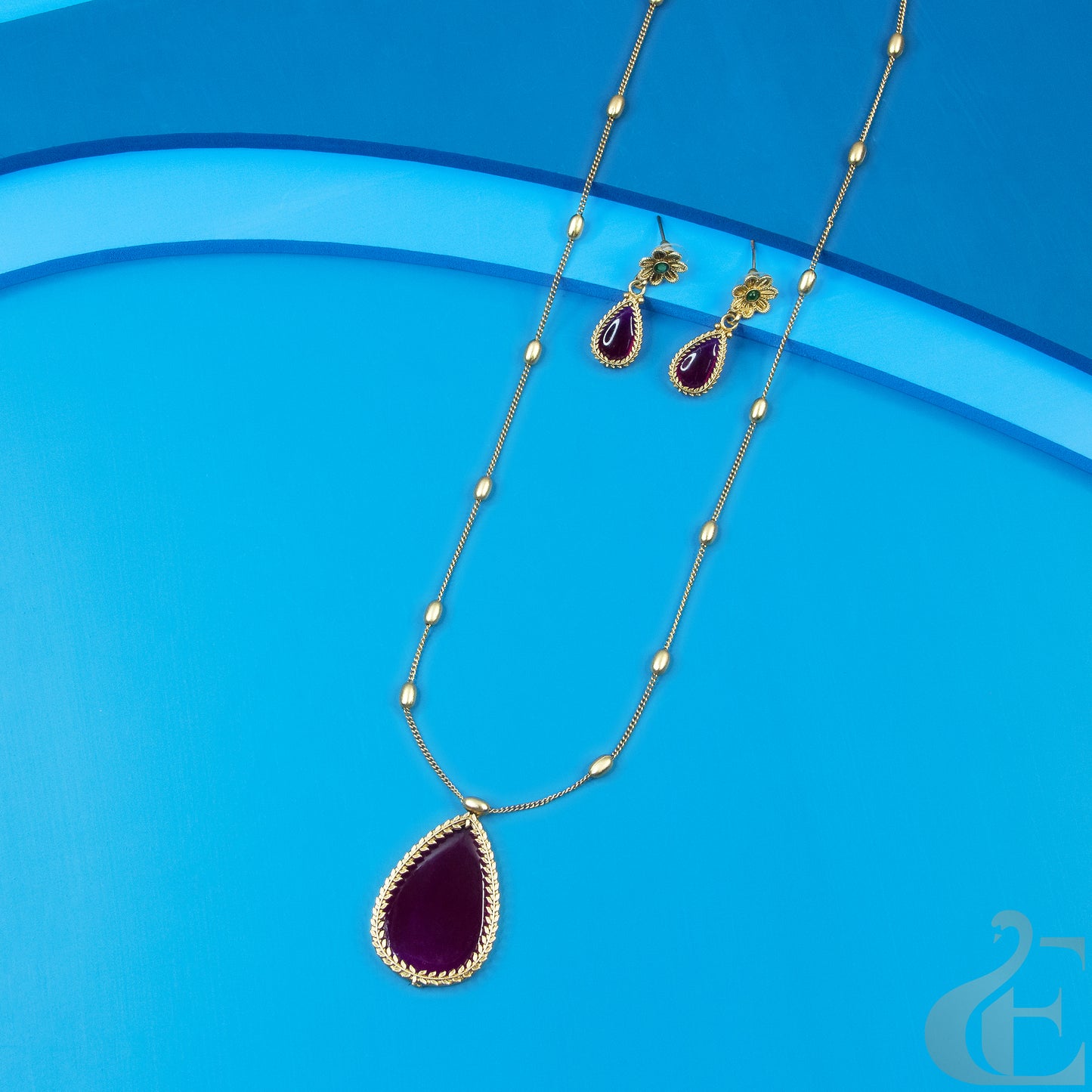 Top view of Long Chain Necklace & Earrings Ruby Stones