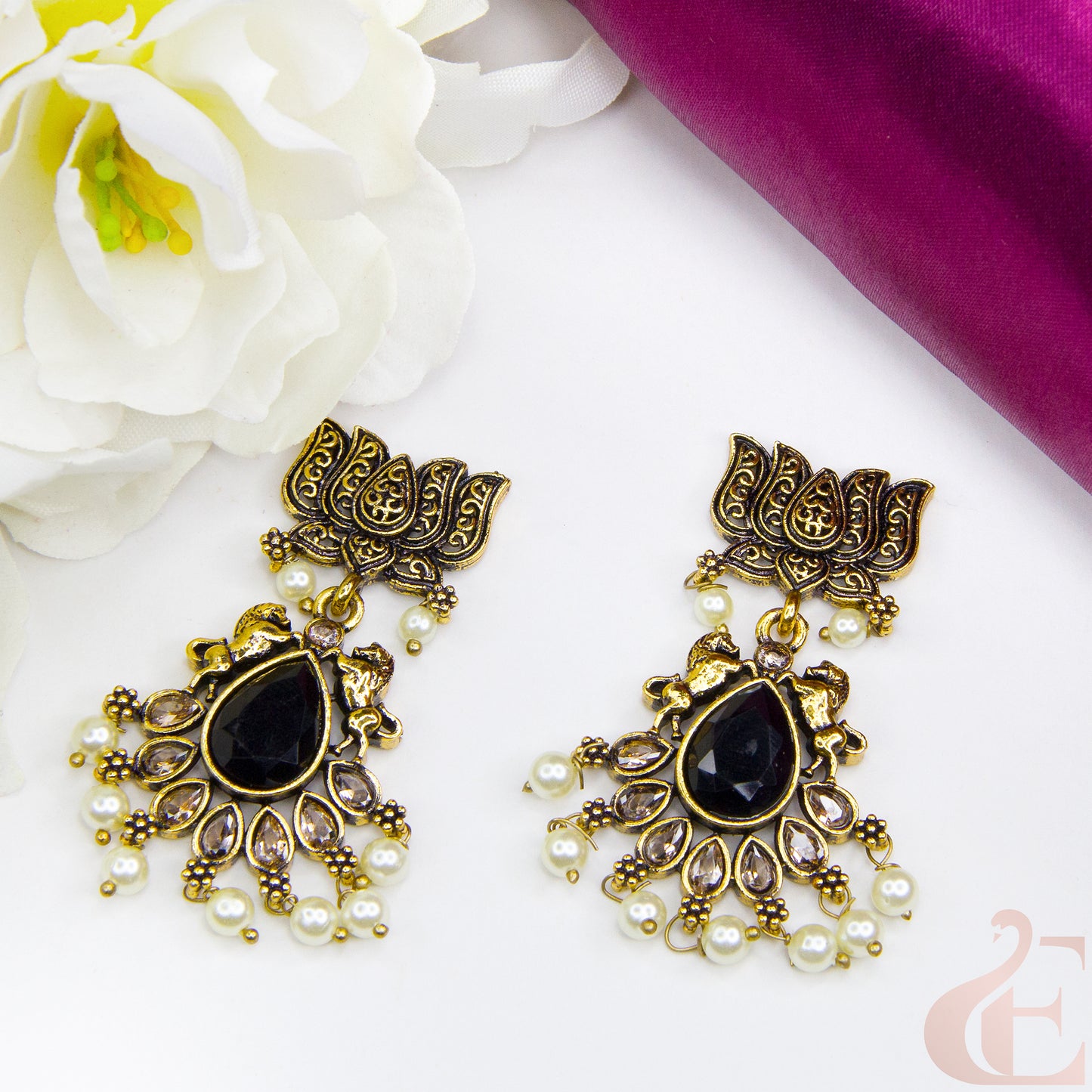 Top view of Mehndi finish lotus & horse designed earrings Black Stone 