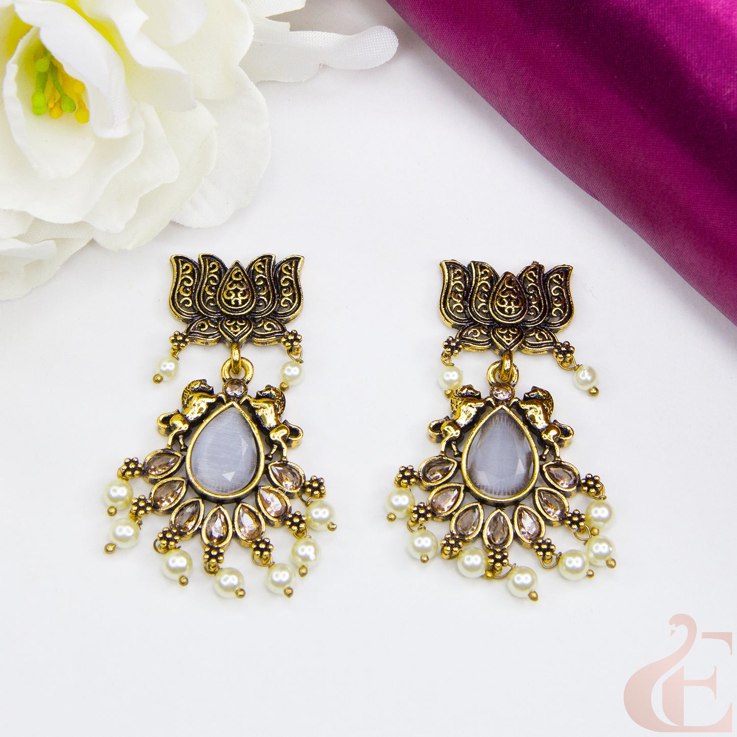 Top view of Mehndi finish lotus & horse designed earrings Grey Stone 