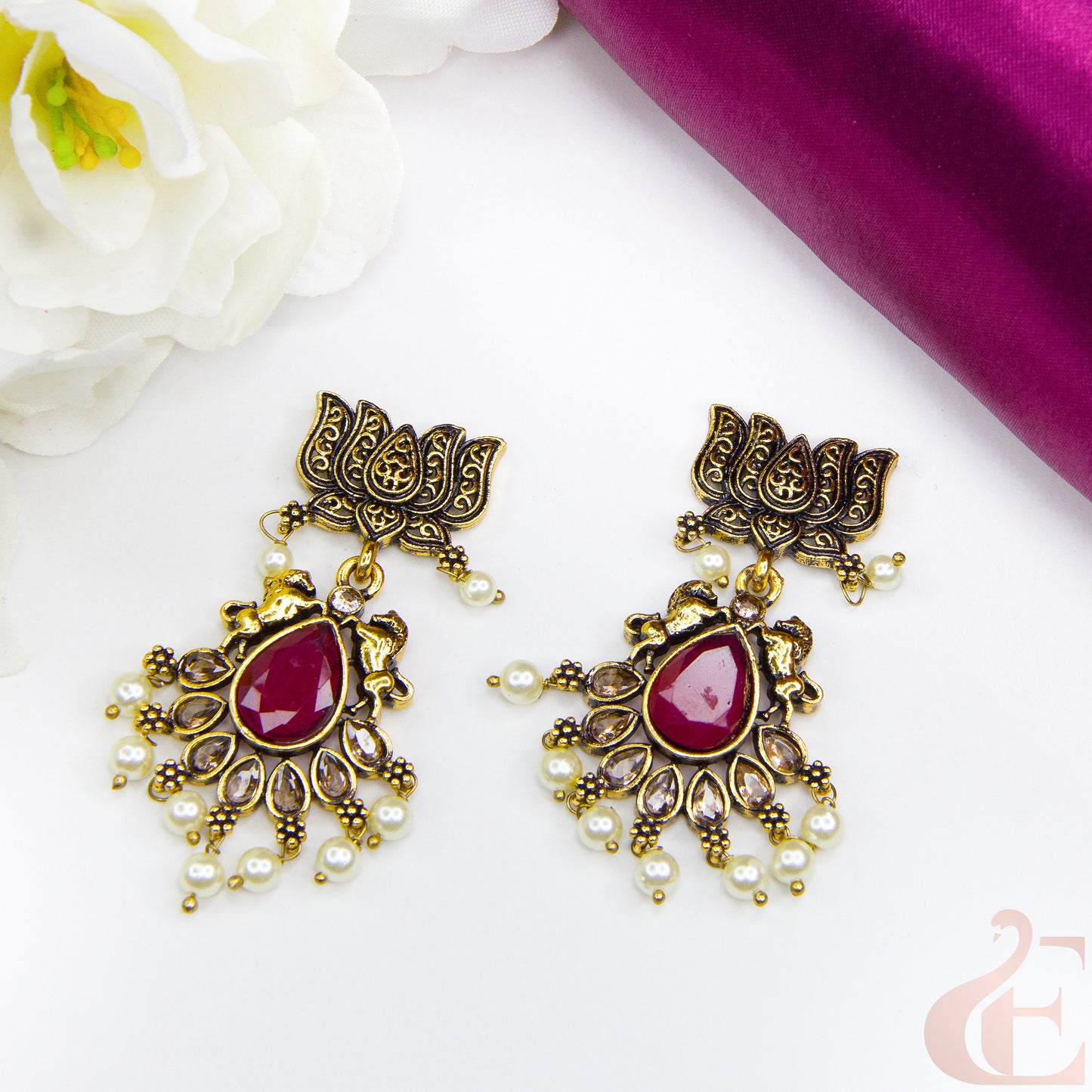Top view of Mehndi finish lotus & horse designed earrings Ruby Stone 