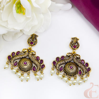 Top view of Mehndi finish oxidised earrings Ruby Green Stone