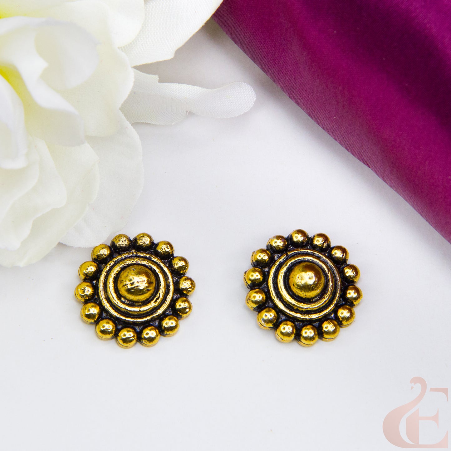 Top view of Oxidised Golden Black Round Ear Stud Earrings