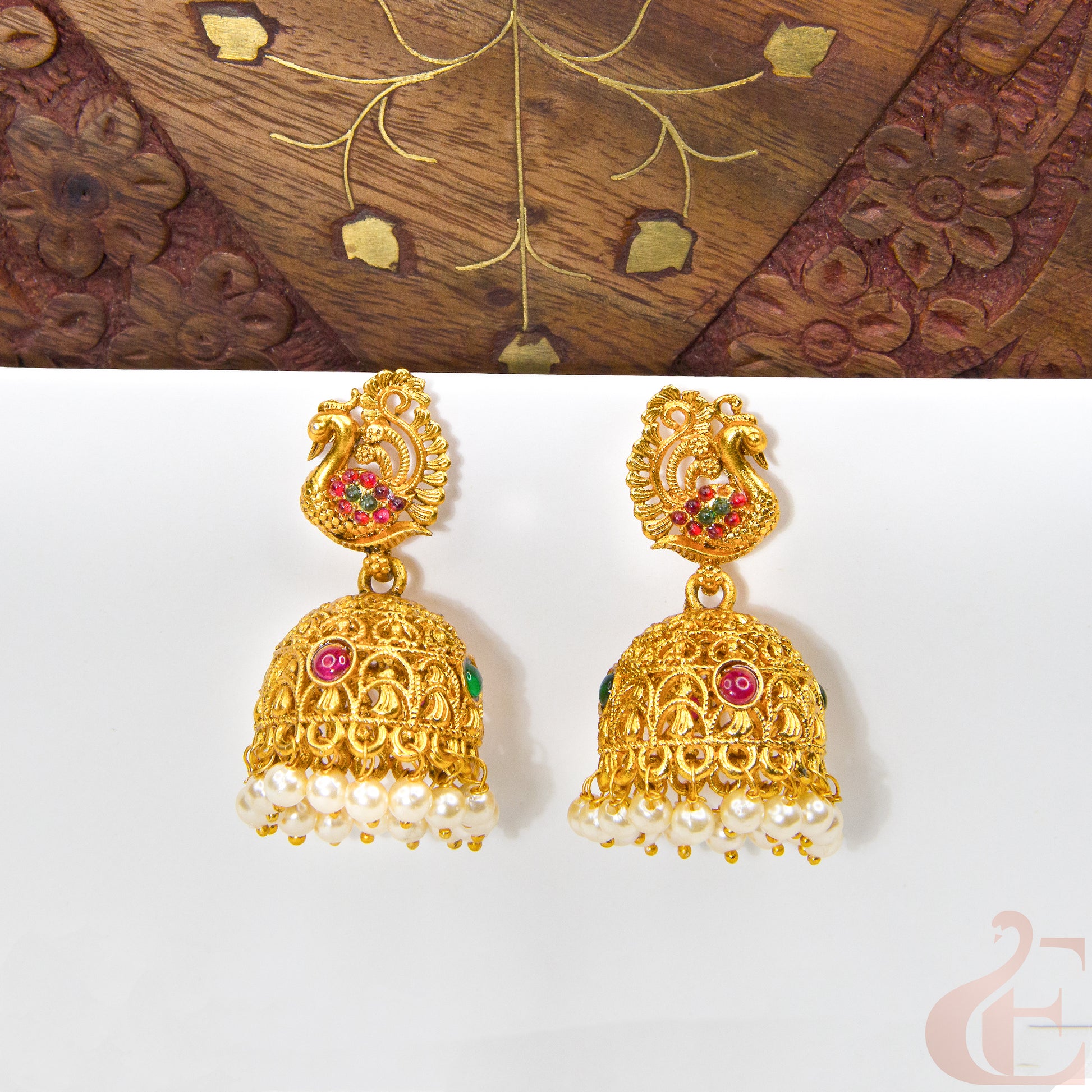 Front view of Peacock Ruby Green Stone Antique Jhumka