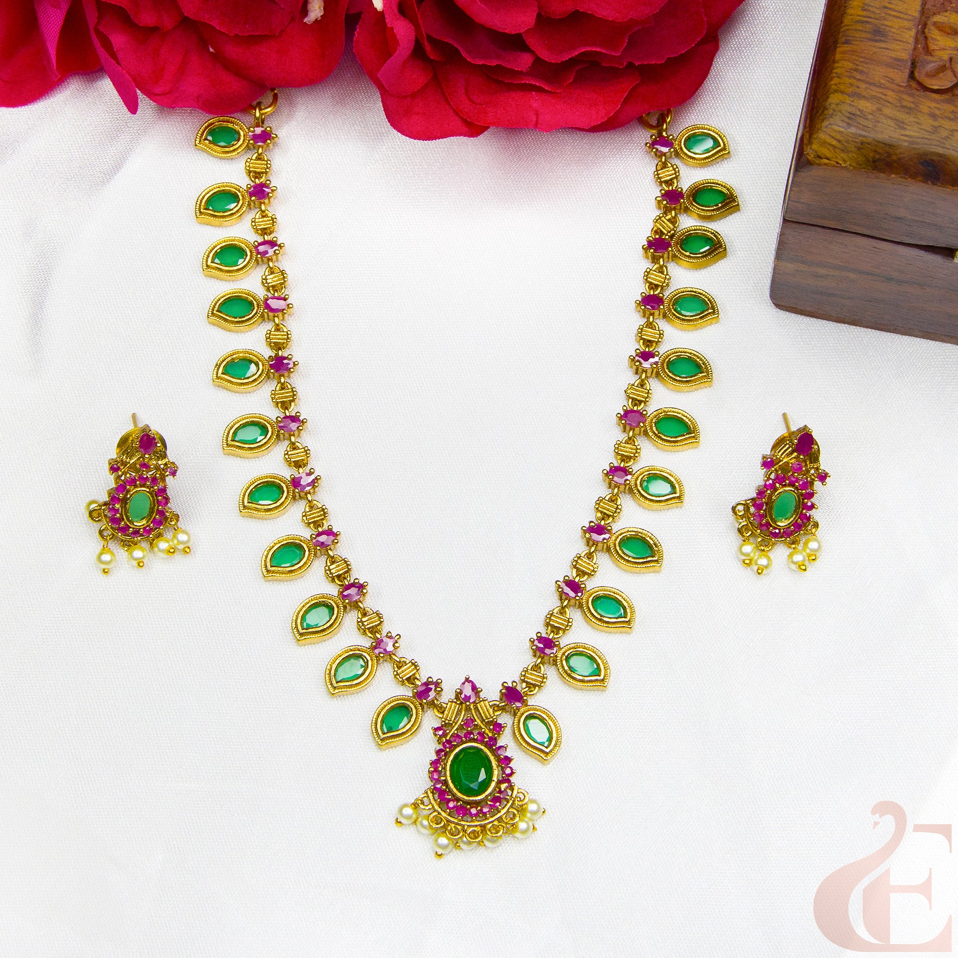 Top view of Premium AD Gold Plated Necklace & Earrings green ruby stones 