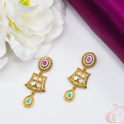 Side angle Top view of Premium AD Stones Antique Earrings ,Ruby Green white stones 