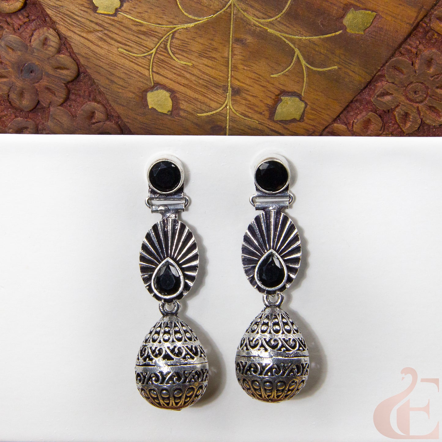 Front view of Premium Silver Replica Earrings black stone