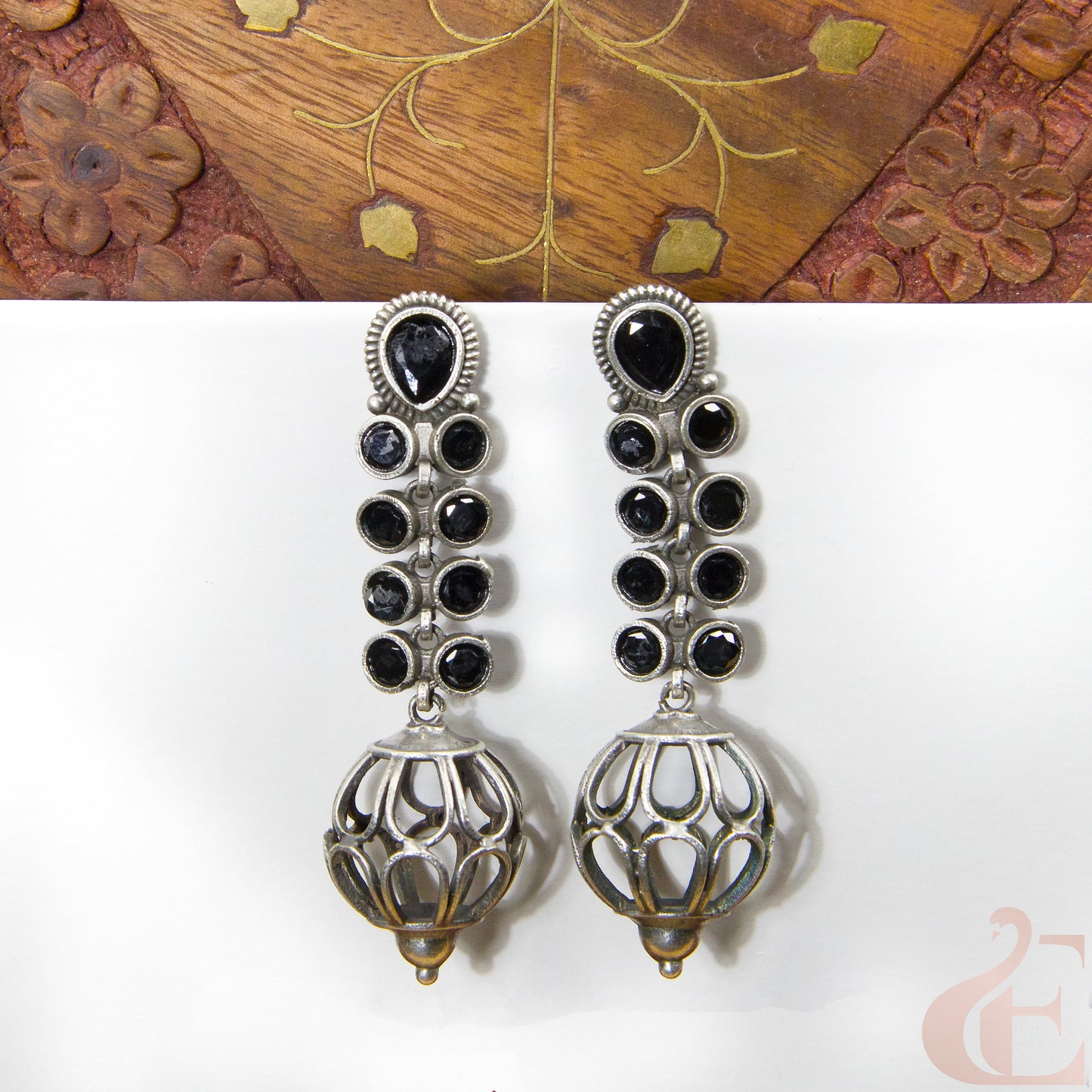 Front view of Premium Silver Replica Earrings black stone