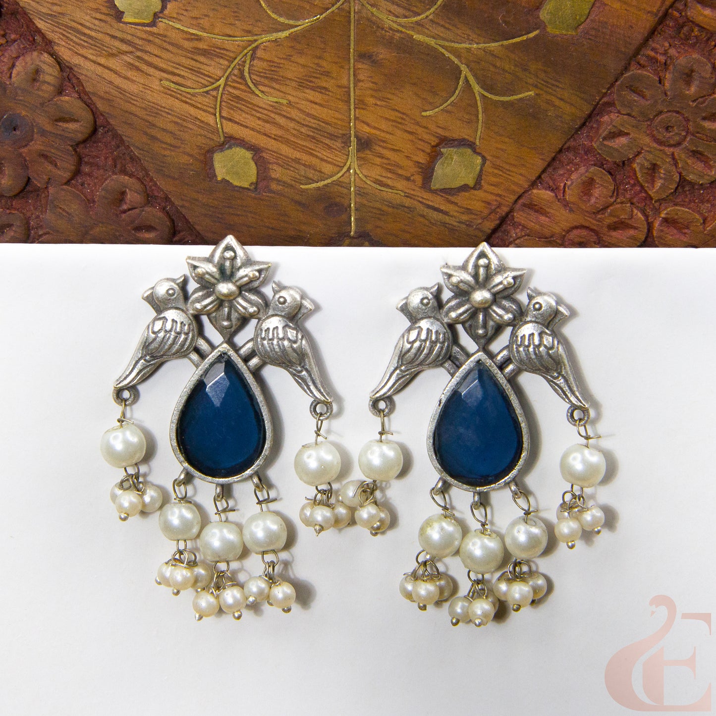 Front view of Premium Silver Replica Earrings blue Stone