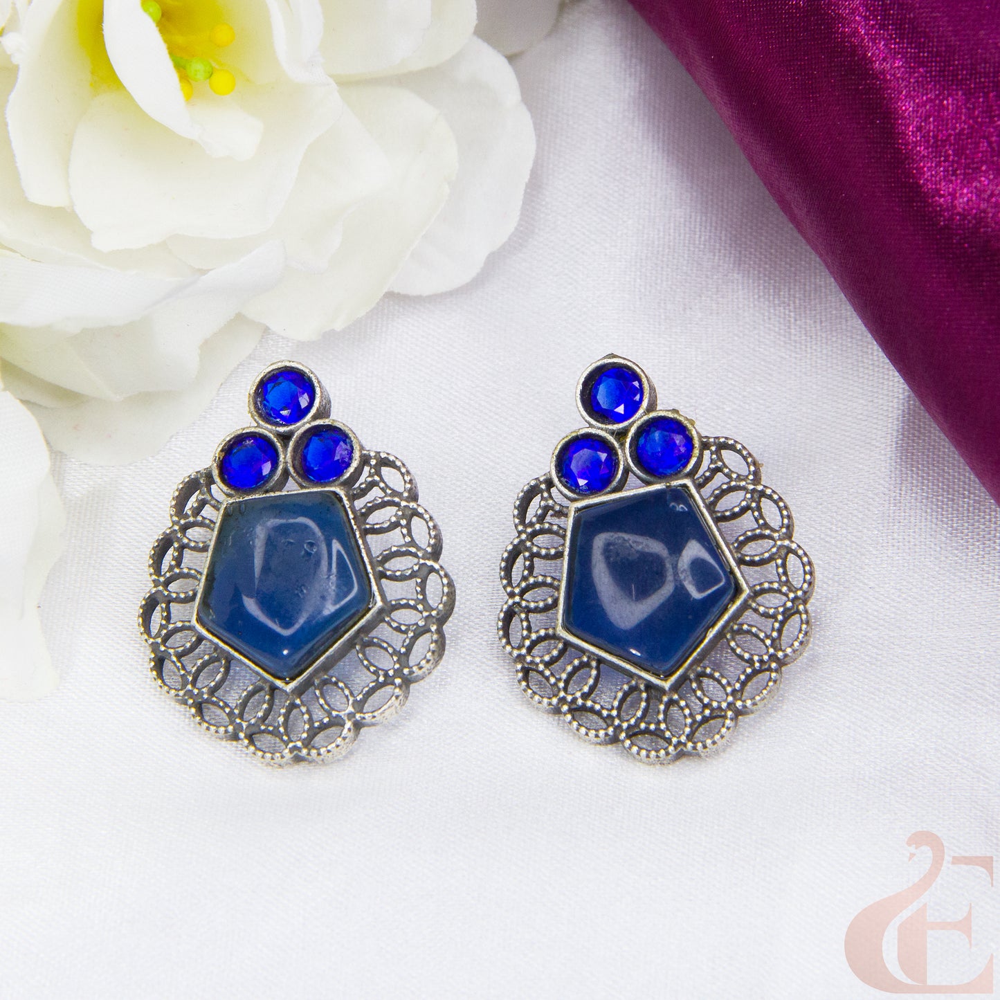 Front view of Premium Silver Replica Earrings  blue stone 