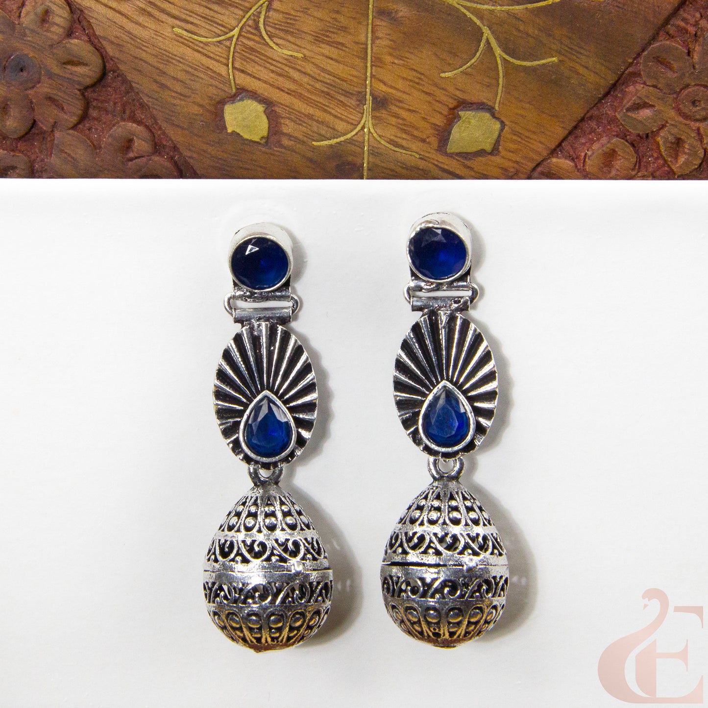 Front view of Premium Silver Replica Earrings blue stone