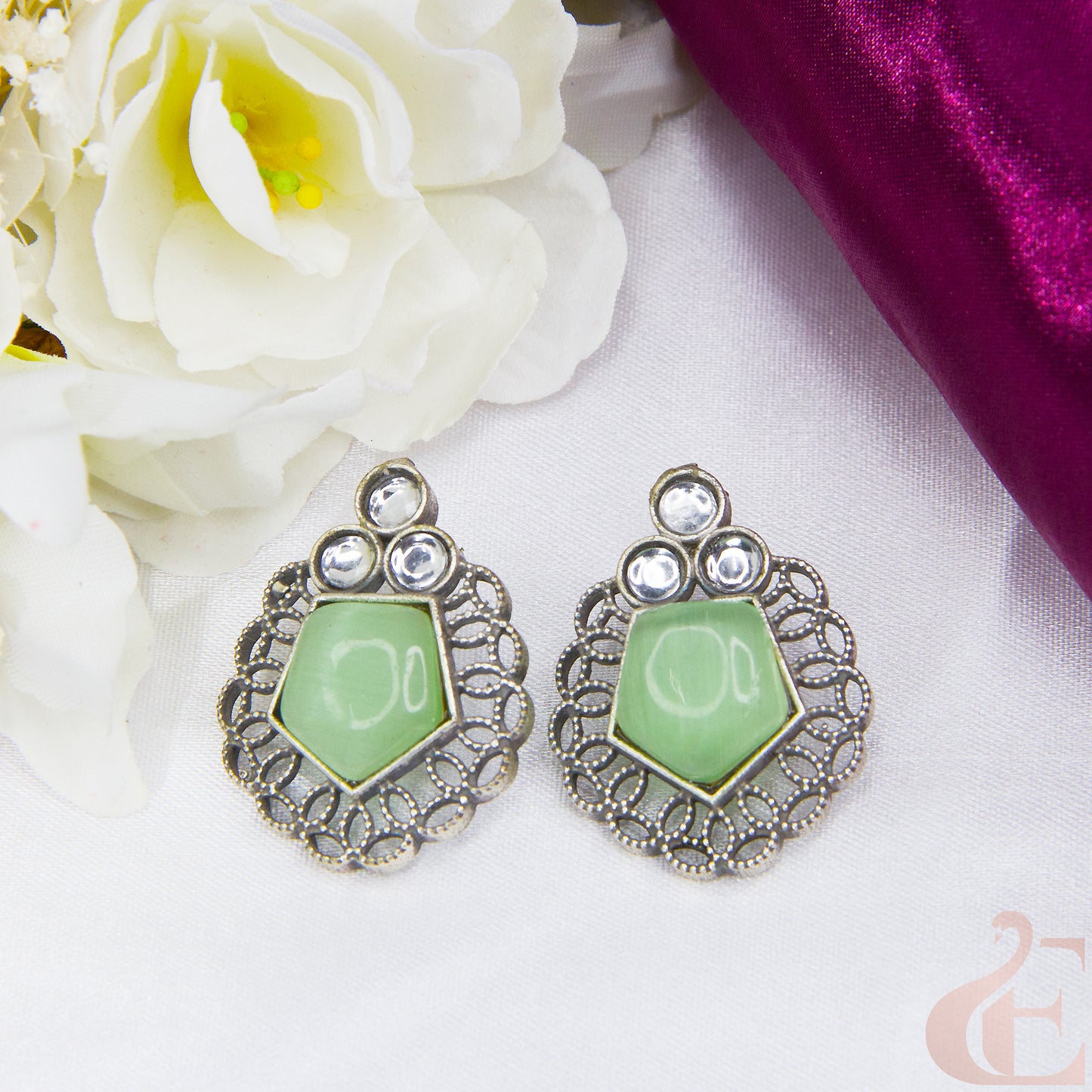 Front view of Premium Silver Replica Earrings pista green stone 