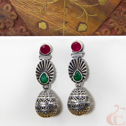Front view of Premium Silver Replica Earrings ruby green stone