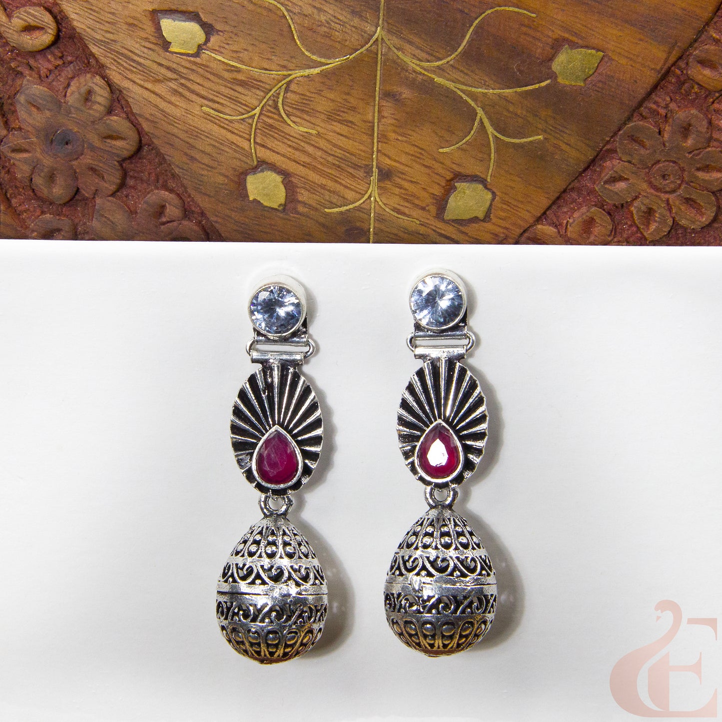 Front view of Premium Silver Replica Earrings white ruby stone