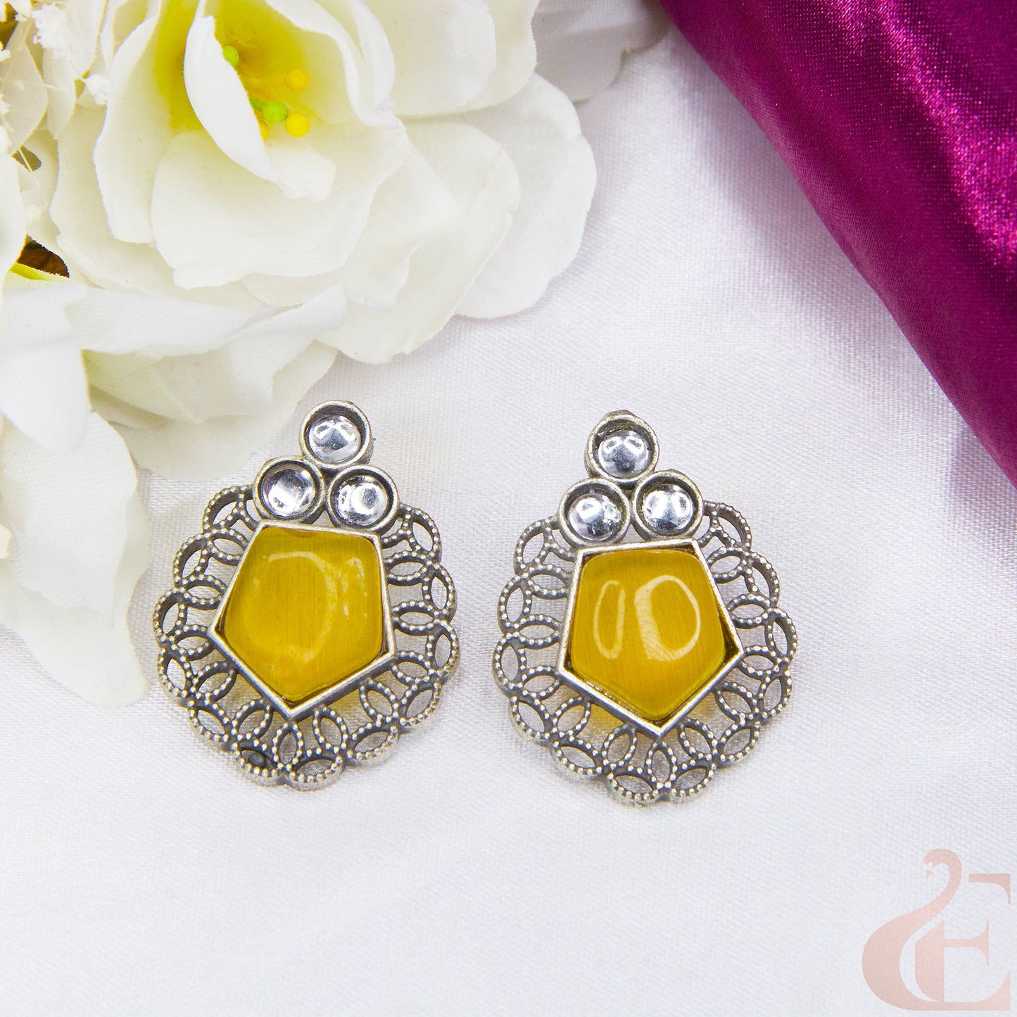 Front view of Premium Silver Replica Earrings yellow stone 