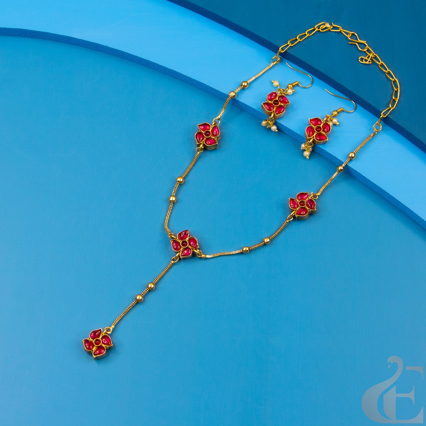 Top view of Reversible Matte Finish Necklace With Hook Earrings Ruby Green Stones