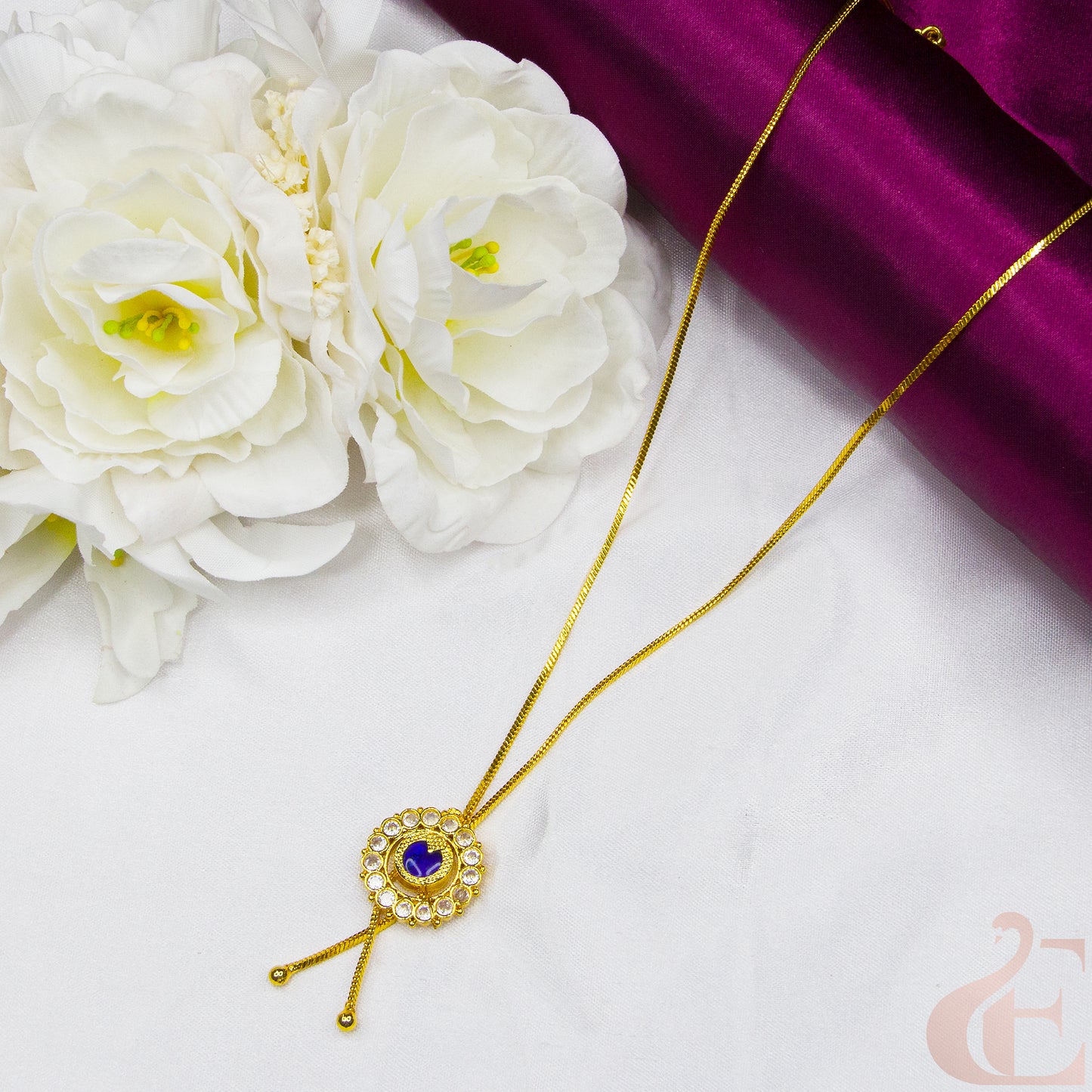 Top view of Round Design Gold Look Palakka Pendant Necklace , Blue white stones 