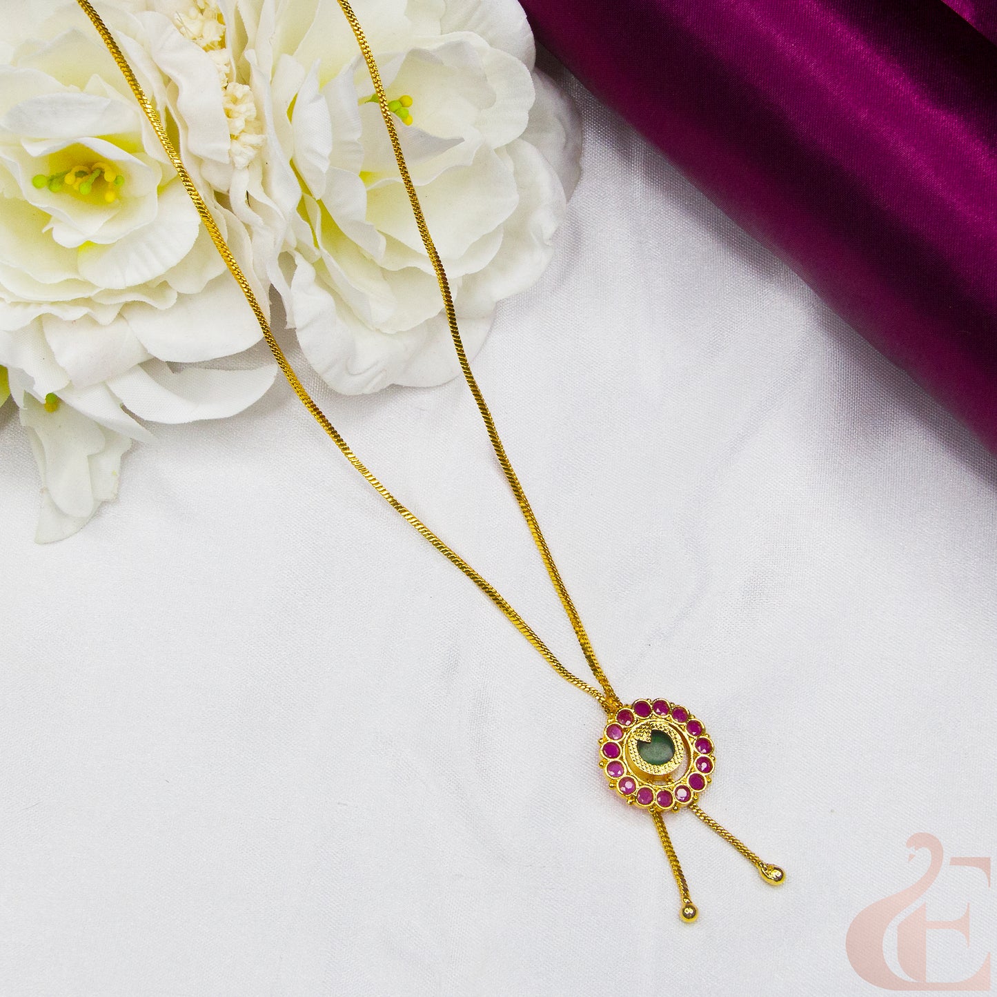 Top view of Round Design Gold Look Palakka Pendant Necklace , Ruby green stones 