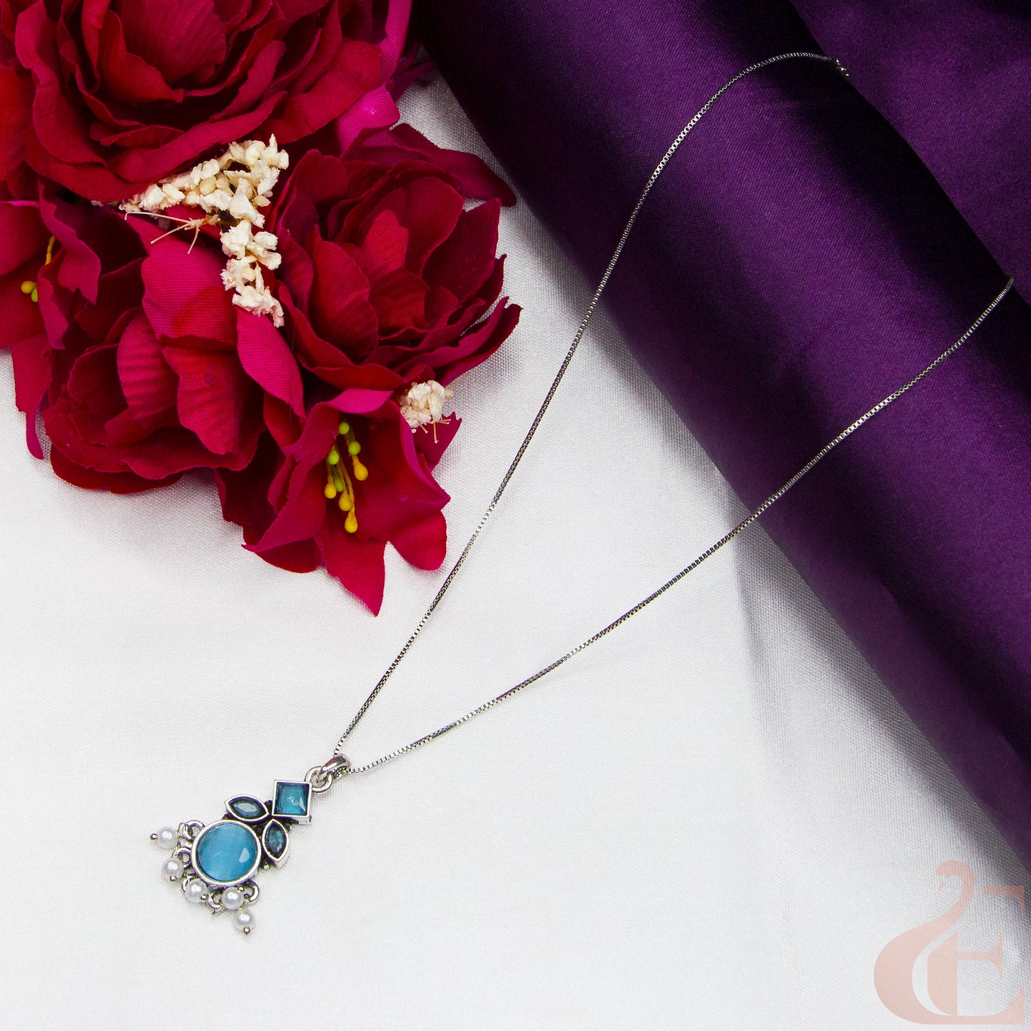 Top view of Simple Chain Oxidised Pendant Necklace Light Blue Stone 