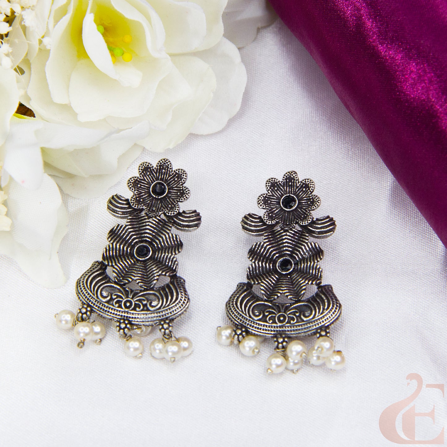 Top view of Premium Silver Replica Earrings black small stones