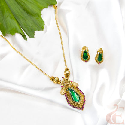 Top view of Traditional Kerala Temple Naga padam Neckpiece & Earrings Green Ruby stones