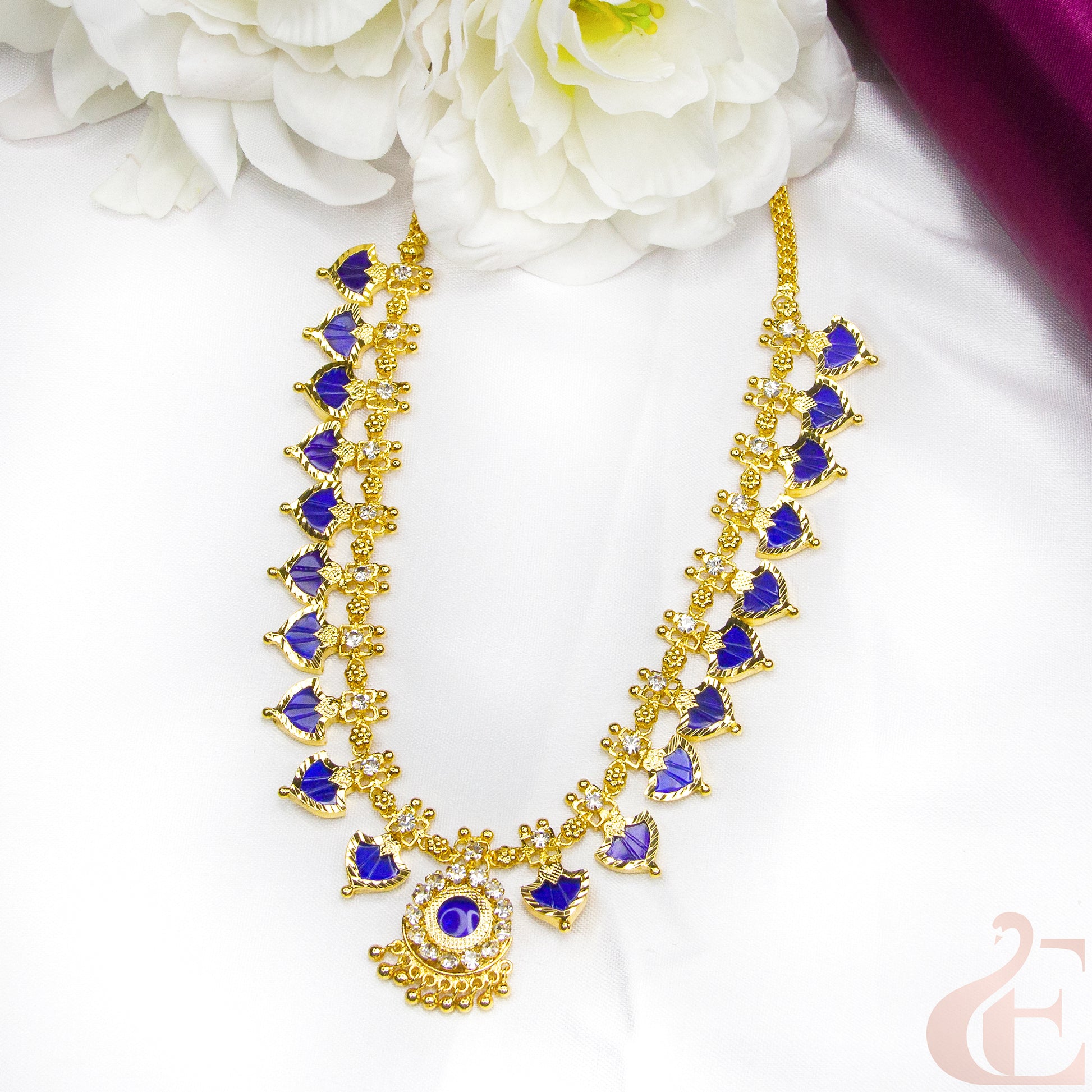 Top view of Traditional Palakka Necklace , blue and white stones 