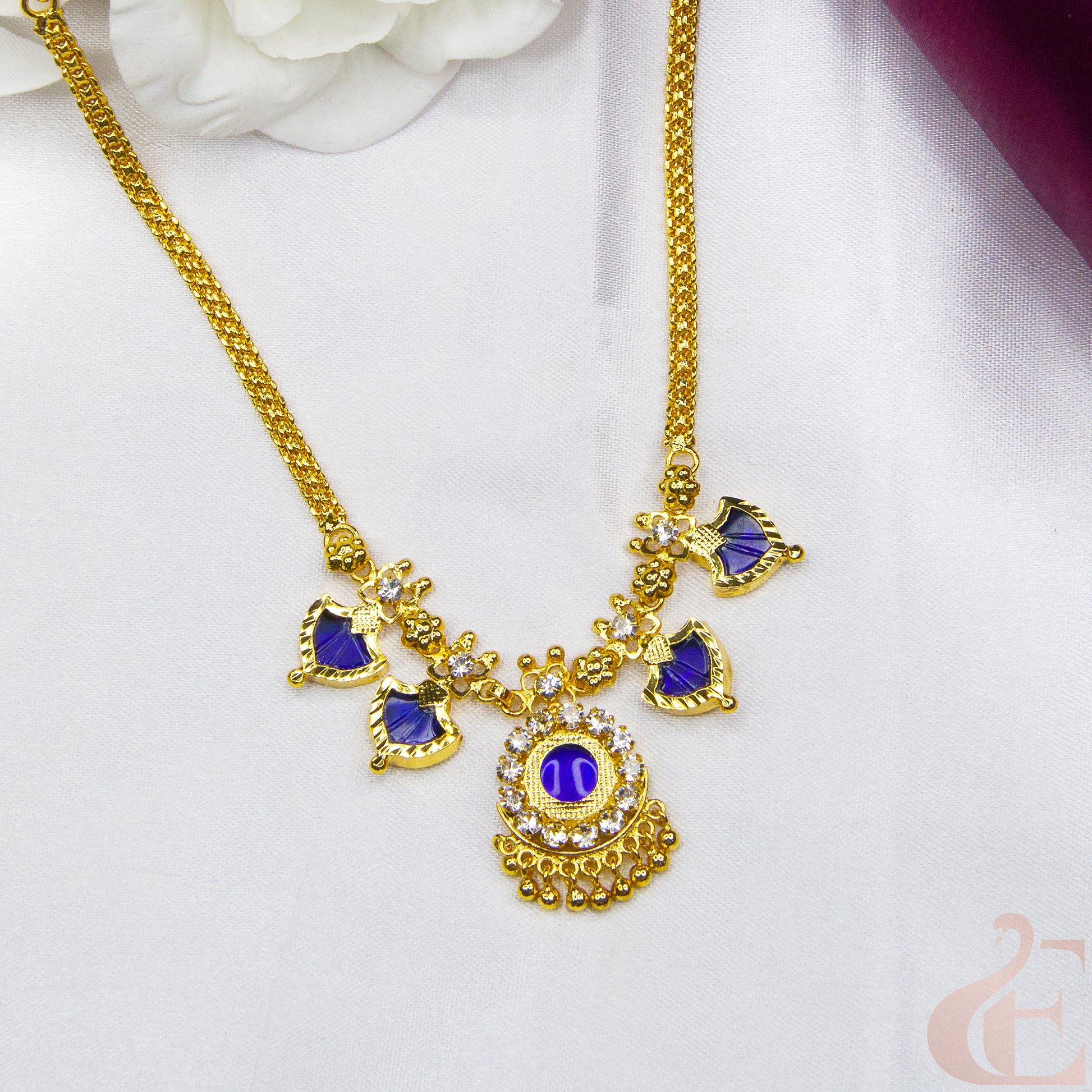 Top view of Traditional Palakka Necklace Blue Stones and small white stones 