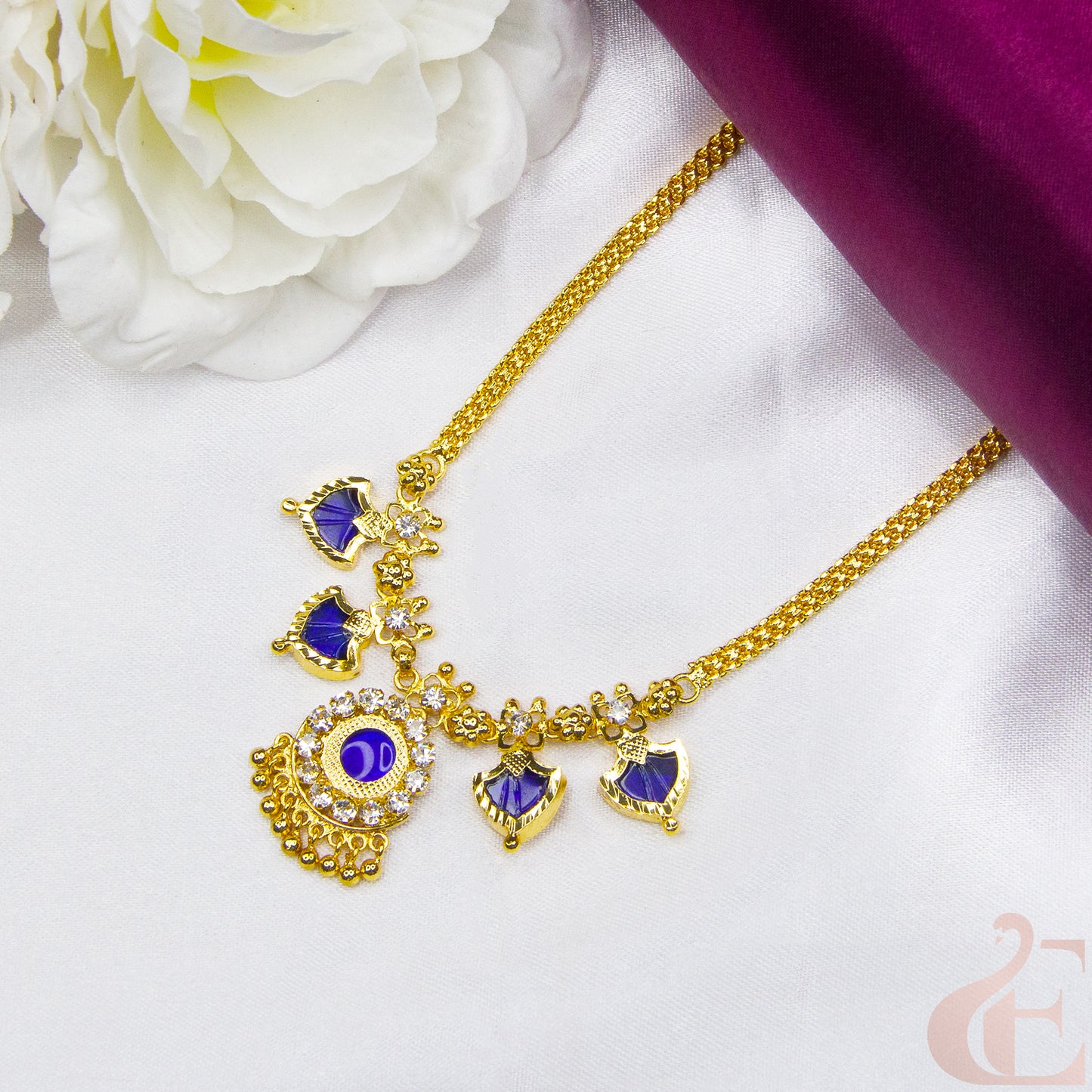 Top view of Traditional Palakka Necklace Blue Stones and small white stones 