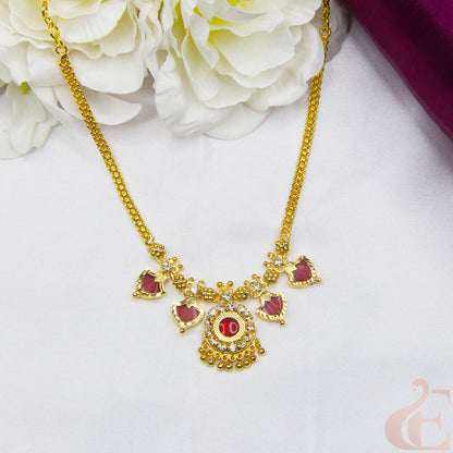 Top view of Traditional Palakka Necklace Red Stones and small white stones 90