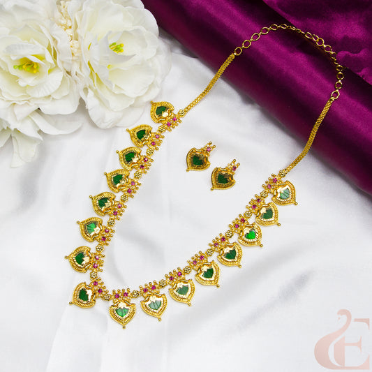 Top view of Traditional Palakka Necklace & studs Green stones 