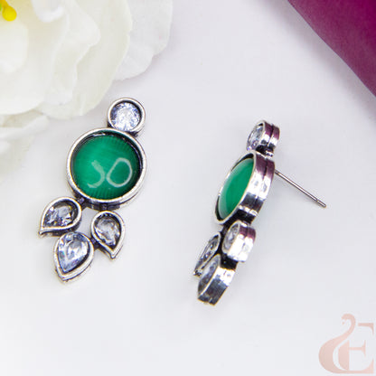 Top side angle view of Trendy Oxidized Silver Earring green and white Stone 