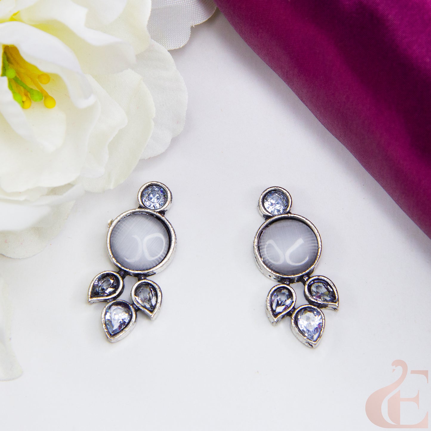 Top view of Trendy Oxidized Silver Earring off white Stone 